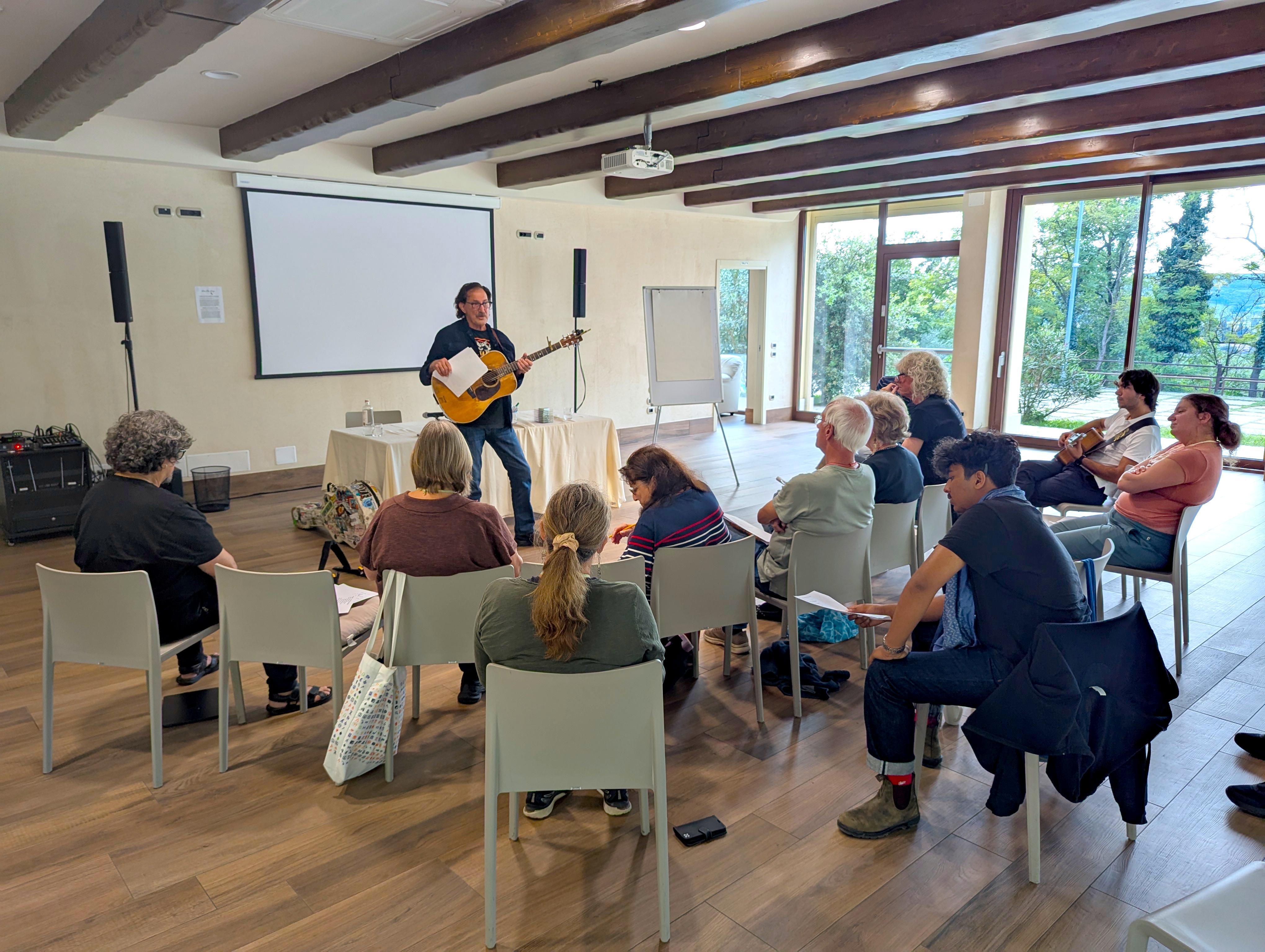 Freebo leads a songwriting class